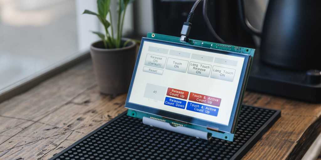 Setting Processing According to the Touch State in the Button Object
